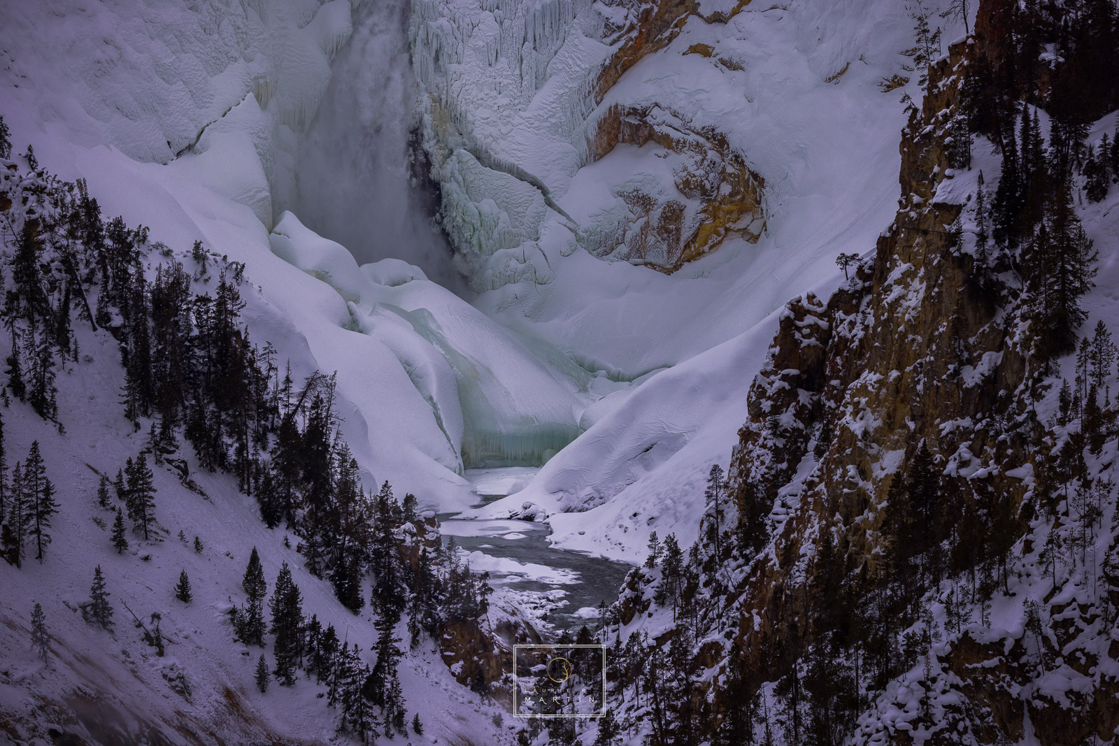 This is the base of the falls at Canyon in Yellowstone. This location is further into Yellowstone in the winter and you need...